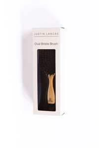 Rose gold oval bristle brush